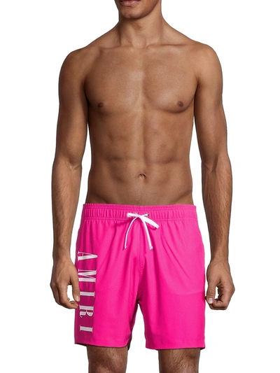 Shop Amiri Vertical Logo Swim Trunks In Peacock