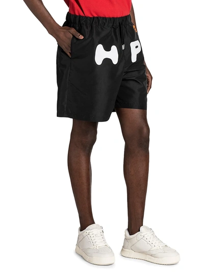 Shop Heron Preston Logo Print Nylon Shorts In Black White