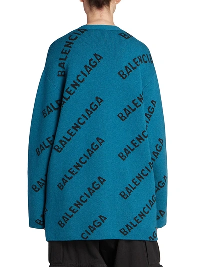 Shop Balenciaga Oversized Logo Cardigan In Petrol Blue Black