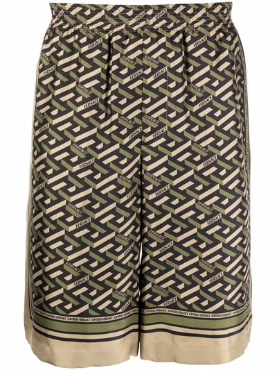 Shop Versace Greca-print Silk Shorts In Grün