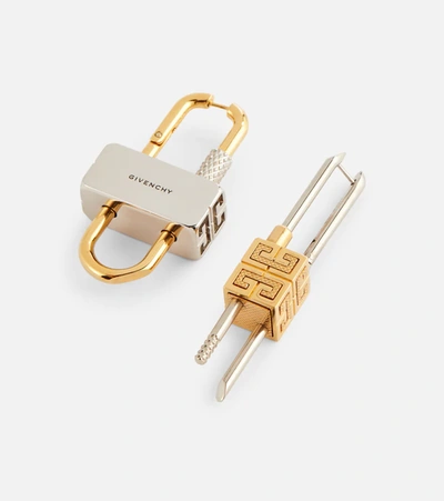 Shop Givenchy Lock Asymmetric Earrings In Gold