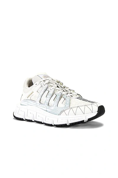 Shop Versace Trigreca Sneaker In White & Gold