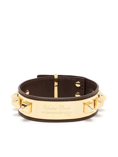 Shop Undercover Spike-detail Leather Cuff In Gold