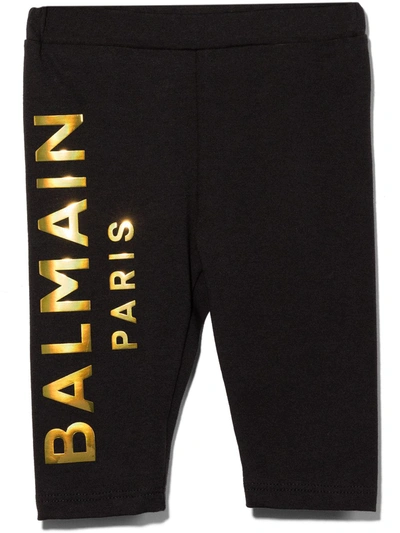 Shop Balmain Metallic Logo Print Leggings In Black