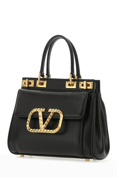 Shop Valentino White Leather Leather Small Rockstud Alcove Handbag White  Garavani Donna Tu