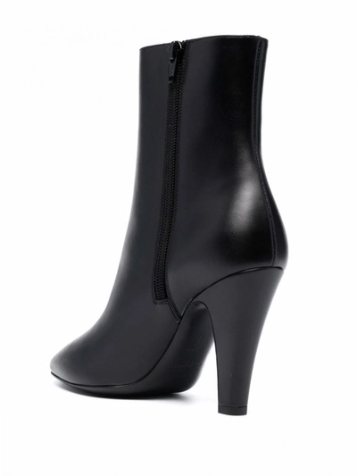 Shop Saint Laurent 68 Leather Heel Ankle Boots In Black
