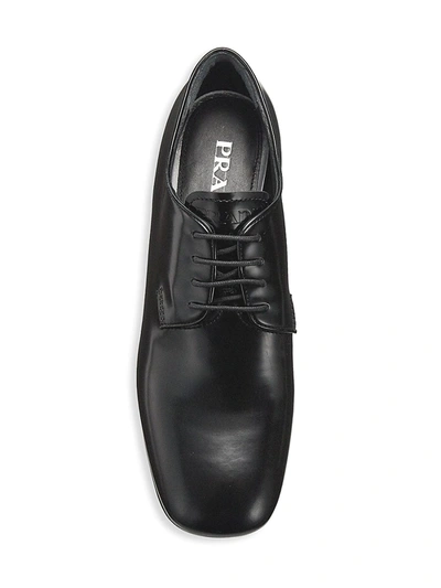 Shop Prada Platform Leather Loafers In Nero