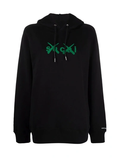 Shop Sacai X Kaws Logo-print Hoodie In Black