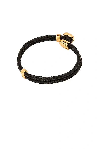 Shop Versace Bracelet In Black & Gold