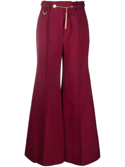 Shop Zimmermann Chain-link Detail Flared Trousers In Red