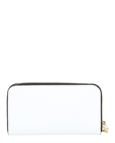 Shop Moschino Logo Leather Wallet In White