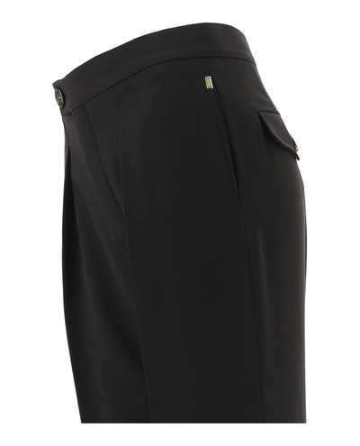 Shop Chloé High-waist Pleated Pants In Black