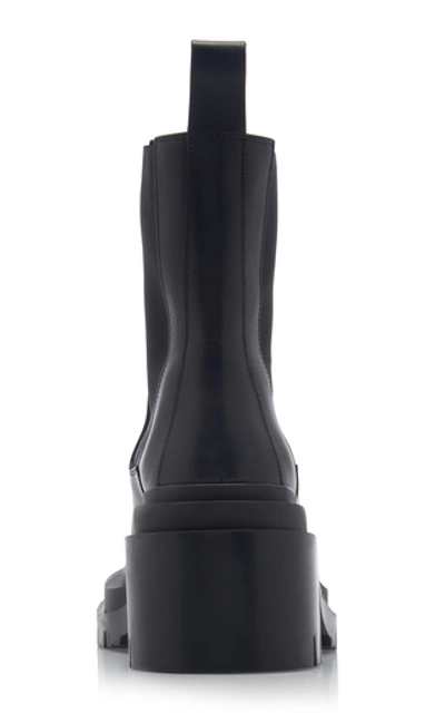 Shop Bottega Veneta The Lug Leather Ankle Boots In Black