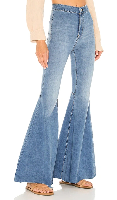 Shop Free People X We The Free Flare Float On Pant In Blue