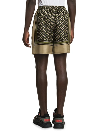 Shop Versace Silk Monogram Shorts In Yellow Multicolor