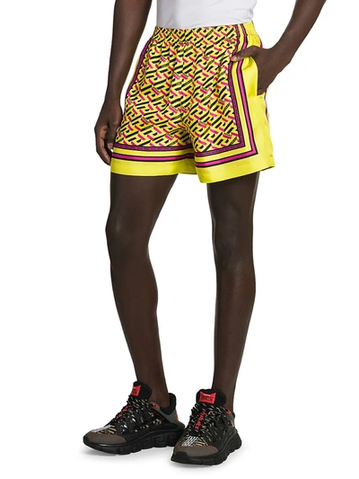 Shop Versace Silk Monogram Shorts In Yellow Multicolor