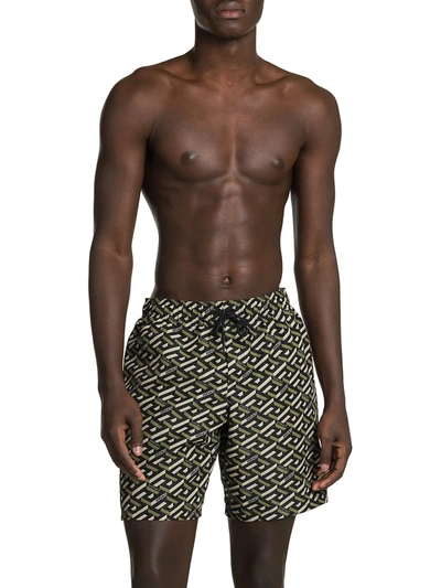 Shop Versace Men's Nylon Monogram Print Swim Trunks In Orange Peel Regal Blue