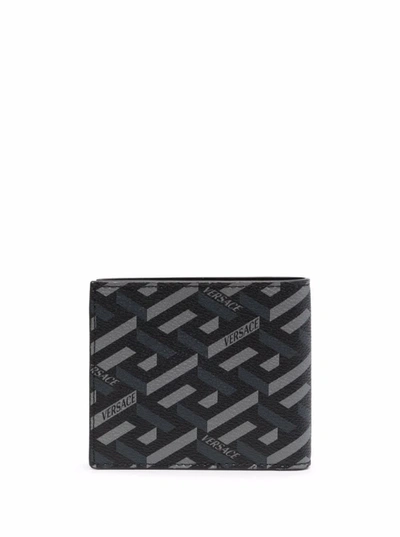 Shop Versace Bifold Monogram Leather Wallet In Black