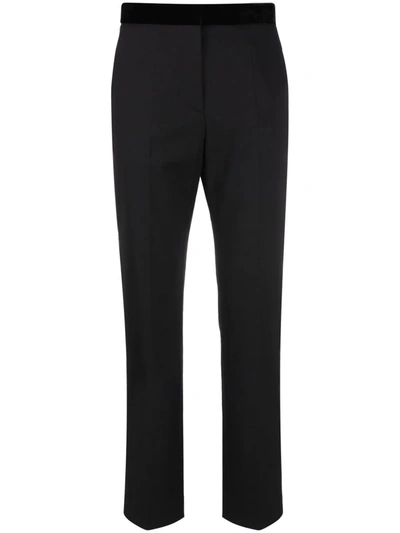 Shop Sandro Pressed-crease Tailored Trousers In Schwarz