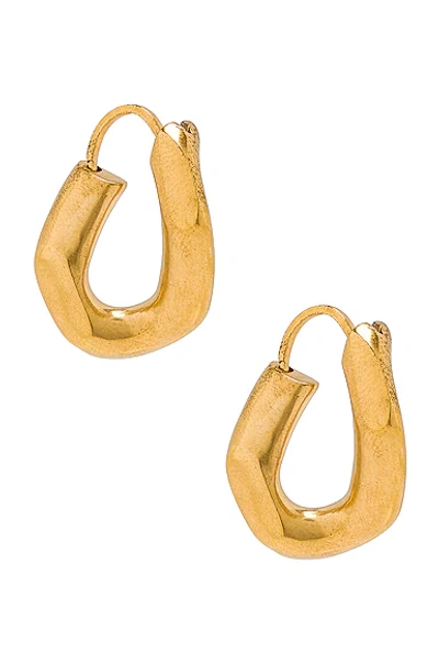 Shop Maison Margiela Curved Earrings In Yellow Gold Plating