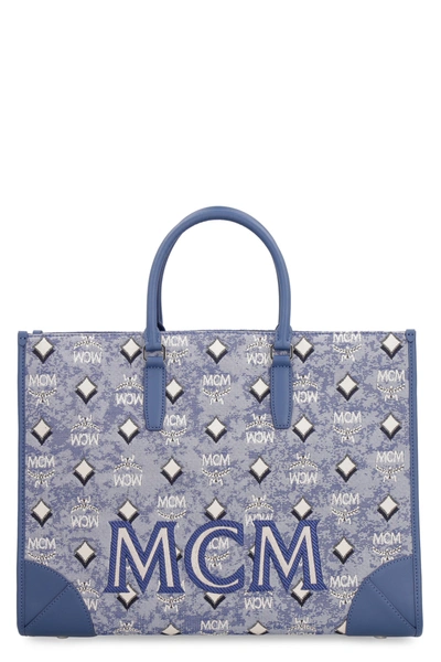 Shop Mcm All Over Logo Canvas Tote In Blue