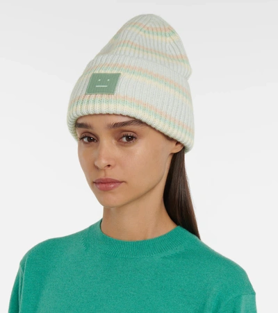 Shop Acne Studios Striped Wool Beanie In Green