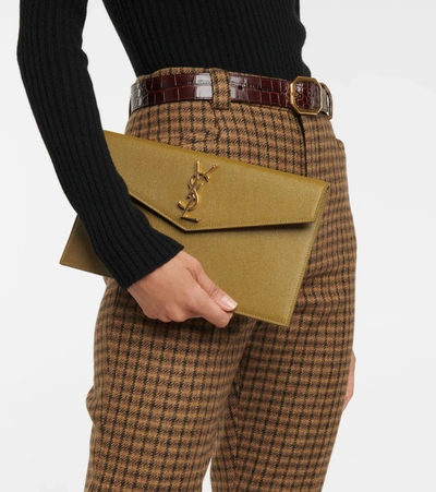 Shop Saint Laurent Uptown Small Leather Clutch In Green