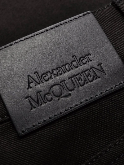 Shop Alexander Mcqueen Logo-embroidered Straight-leg Jeans In Black