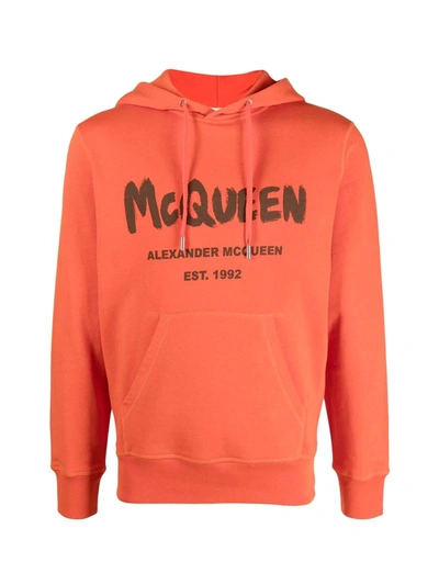 Shop Alexander Mcqueen Logo-print Hoodie In Yellow & Orange