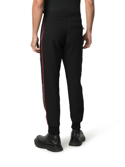 Shop Alexander Mcqueen Logo Tape Track Trousers In Black