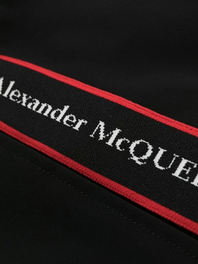 Shop Alexander Mcqueen Logo Tape Track Trousers In Black