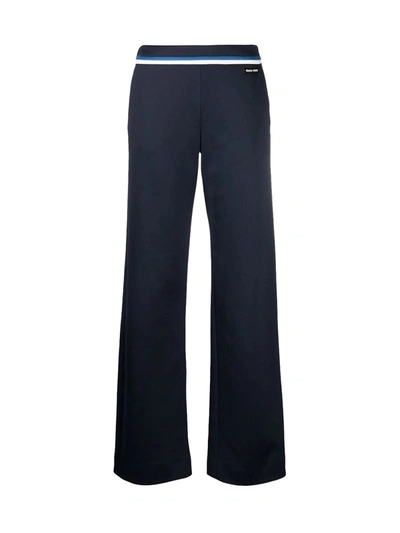 Shop Miu Miu Stripe-detail Flared Trousers In Blue