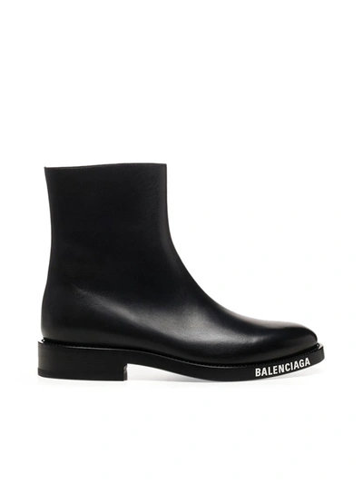 Shop Balenciaga Logo Sole Ankle Boots In Black