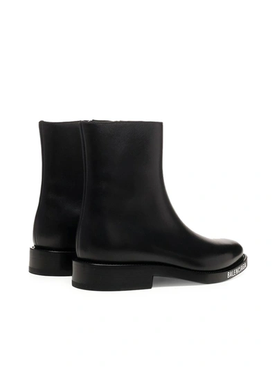 Shop Balenciaga Logo Sole Ankle Boots In Black