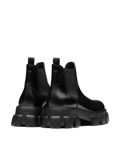 Shop Prada Monolith Brushed Leather Chelsea Boots In Black