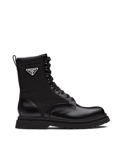 Prada Logo-plaque Panelled Ankle Boots In Black