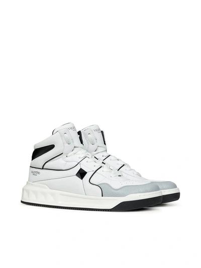 Shop Valentino Garavani One Stud Mid-top Sneaker In Calfskin In White