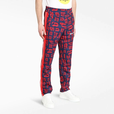 Shop Palm Angels Blue/red Broken Logo Track Pants