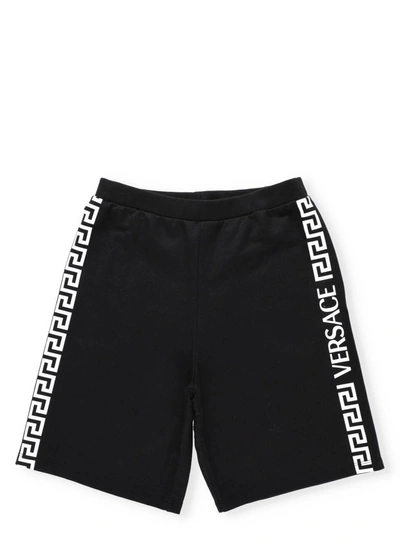 Shop Versace Kids Greca Logo Side Stripe Shorts In Black