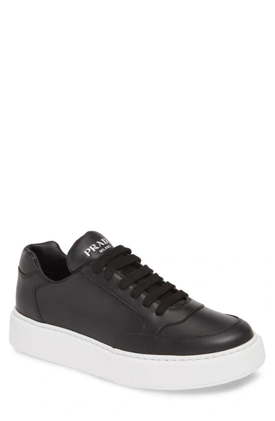 Shop Prada Low Top Sneaker In Nero/ Bianco