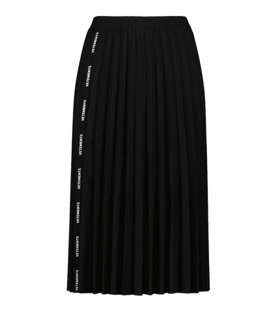 Shop Vetements Logo Pleated Skirt In Black