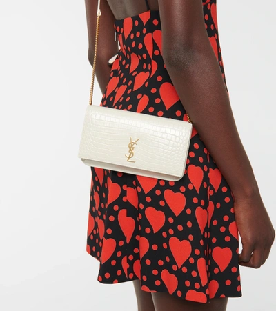 Saint Laurent Cassandre Leather Iphone Crossbody Bag In Crema Soft/crema S.