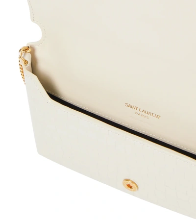 Shop Saint Laurent Cassandre Leather Phone Pouch In Crema Soft/crema S.