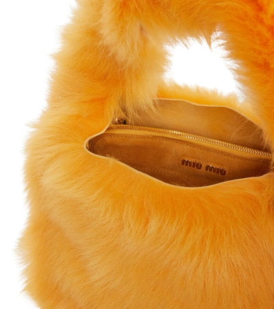 Miu Miu Shearling Shoulder Bag In Orange