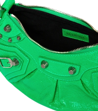 Balenciaga Le Cagole Xs Studded Crinkled-leather Shoulder Bag In Green
