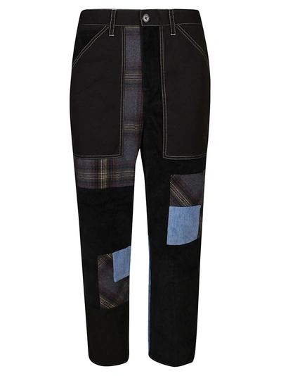 Shop Jw Anderson Patchwork Tapered Pants In Black