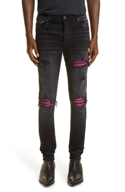 Shop Amiri Mx1 Cracked Paint Leather Patch Ripped Skinny Jeans In Black