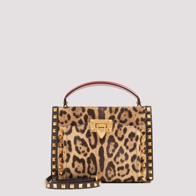 Shop Valentino Garavani Rockstud Leopard Printed Shoulder Bag In Multi