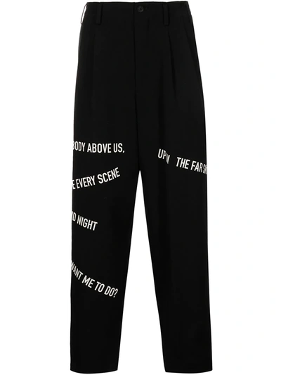 Shop Yohji Yamamoto Slogan-print Dropped-crotch Trousers In 黑色