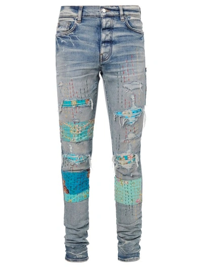 Amiri Quilted Patch Ripped Washed Skinny Jeans In Blue | ModeSens